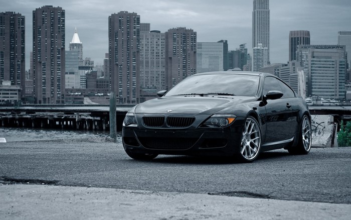 Black BMW M6 Coupe in front of New York City skyline