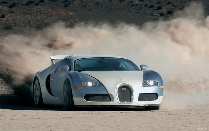 Bugatti Veyron driving on a dirt road