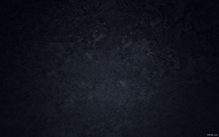 Dark textured surface with subtle lighting