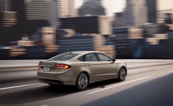 Ford Fusion Platinum driving through a city