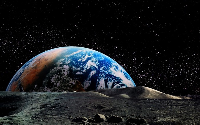 Earth Rising Above the Moon's Surface at Night