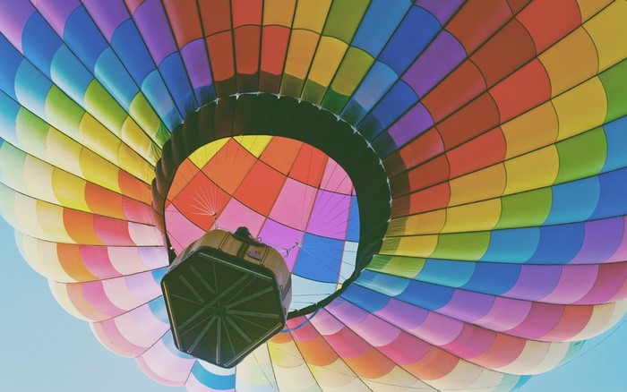 Colorful hot air balloon seen from below