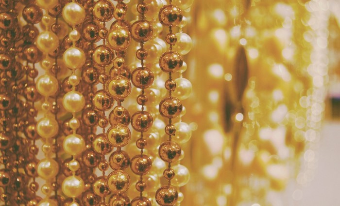 Close up of gold and pearl beads