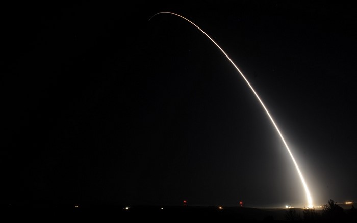 Rocket Launching into the Night Sky