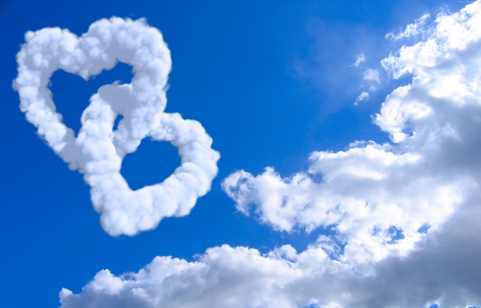 Two Intertwined Heart Clouds in Blue Sky
