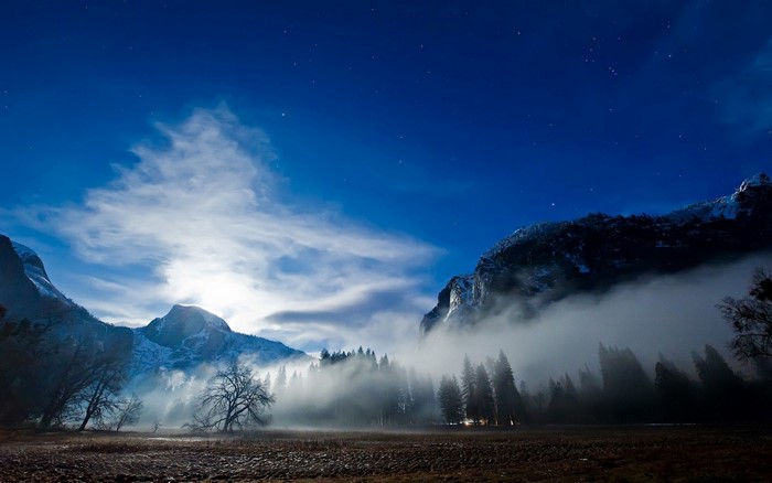 Moonlit Yosemite Valley with Fog and Stars