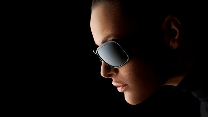 Close up portrait of a woman wearing sunglasses