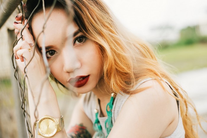Woman with blonde hair and red lipstick