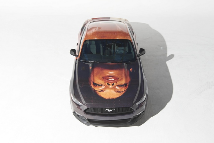 Ford Mustang with portrait art by Thomas Lelu