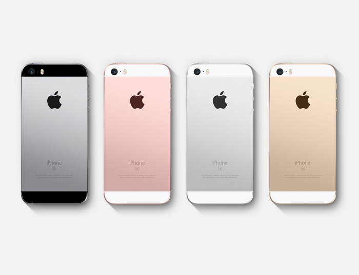 Four iPhones SE in different colors
