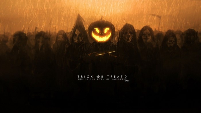 Halloween pumpkin head and hooded figures in rain