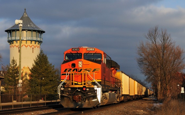 BNSF 6363 locomotive with freight train and water tower