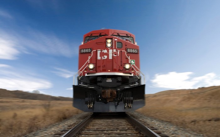 Red Canadian Pacific locomotive 8865 on tracks