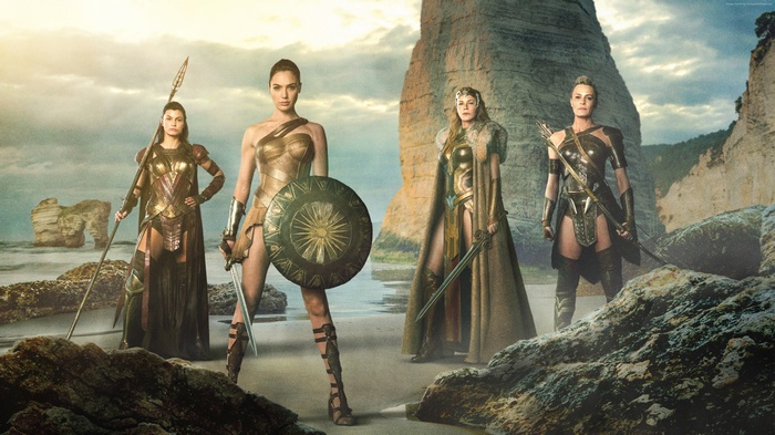Wonder Woman and Amazon warriors on a beach