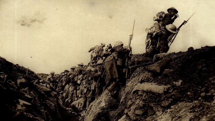 British soldiers climbing out of trenches in World War I