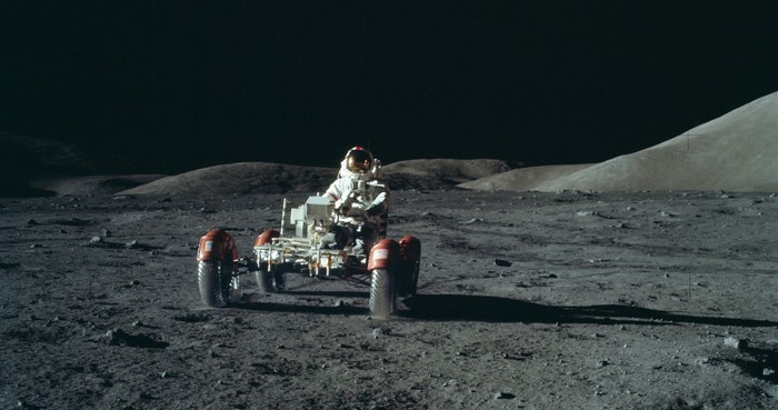 Astronaut on a lunar rover on the Moon