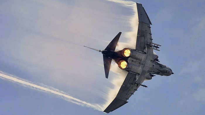 F-4 Phantom II fighter jet performing aerobatics