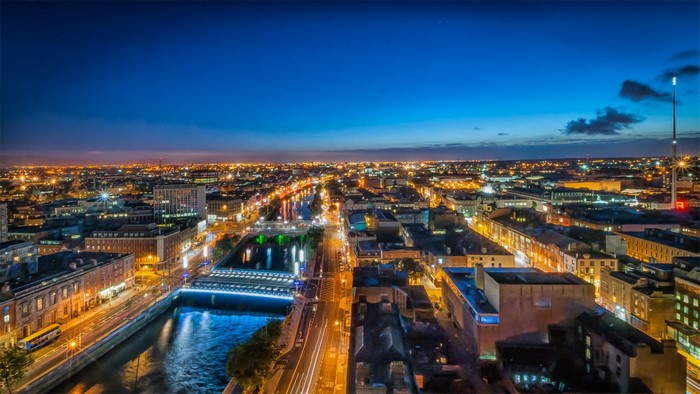 Cityscape at night with river and lights