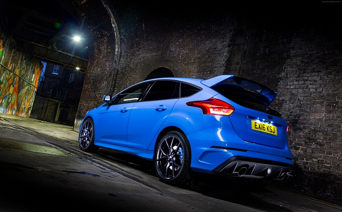 Blue Ford Focus RS hatchback in tunnel at night