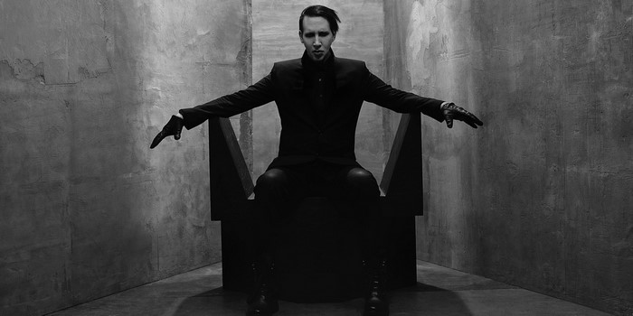 Marilyn Manson Sitting in Dark Monochrome Room