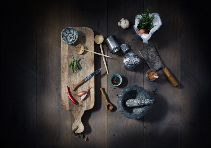 Rustic Kitchen Tools and Herbs on Wooden Surface