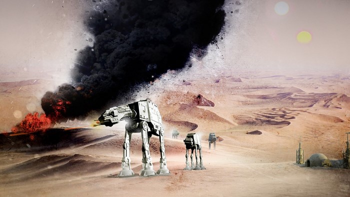 Star Wars AT-ATs in a desert battle with explosions