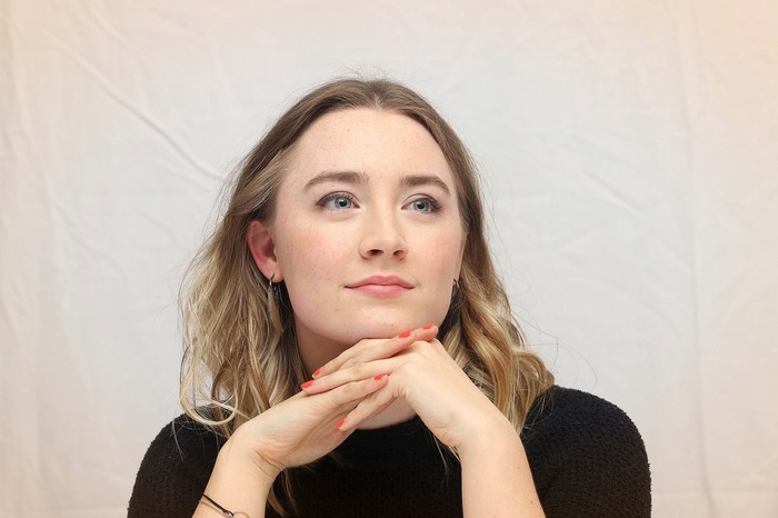 Saoirse Ronan portrait with hands on chin