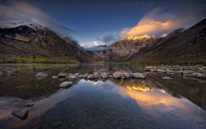Lake reflection of mountains at sunrise