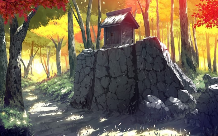 Autumn forest with a small shrine on a stone wall