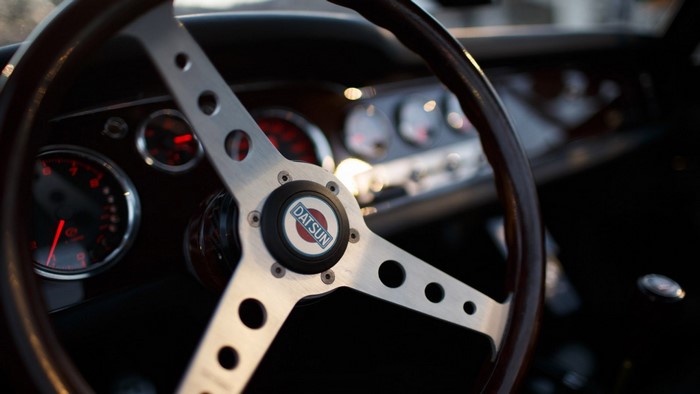 Datsun vintage car steering wheel and dashboard