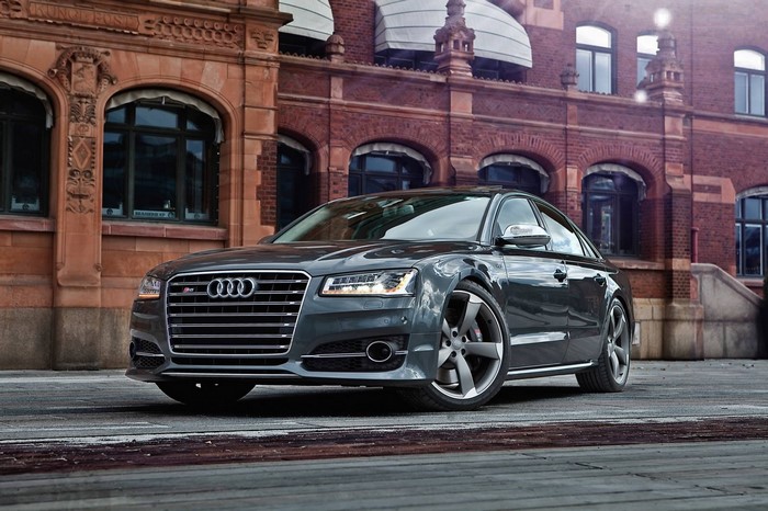 Dark Grey Audi S8 Sedan parked in front of a brick building