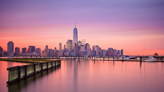 New York City skyline at sunset with One World Trade Center