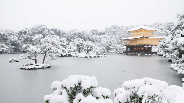 Kinkaku-ji Temple in Kyoto during a winter snowstorm