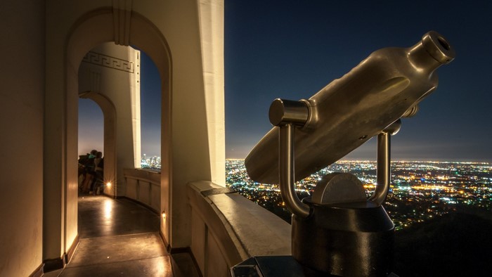 Telescope overlooking Los Angeles at night from Griffith Observatory