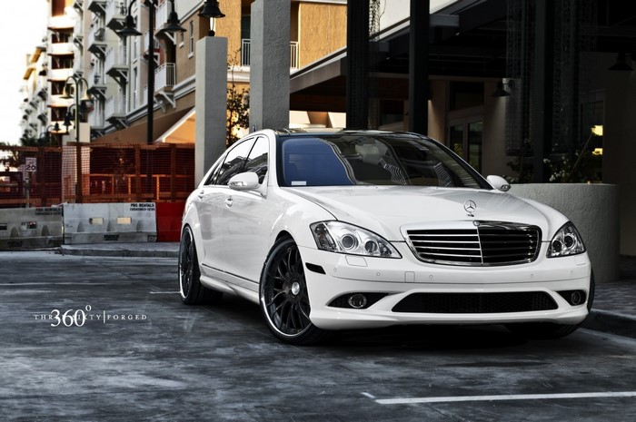 White Mercedes-Benz S-Class Sedan with custom wheels