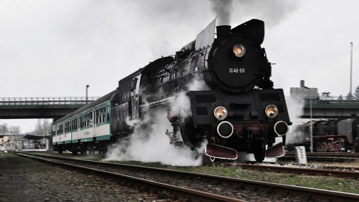 Steam locomotive Ol 49-69 with passenger cars in Poland