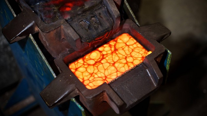 Molten gold in a casting mold