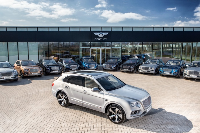 Bentley Bentayga First Edition cars parked outside dealership