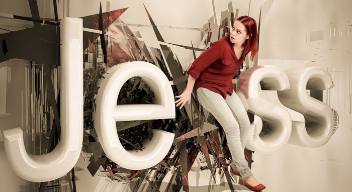 Woman interacting with large 3D letters