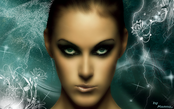 Woman with dramatic eye makeup and green eyes