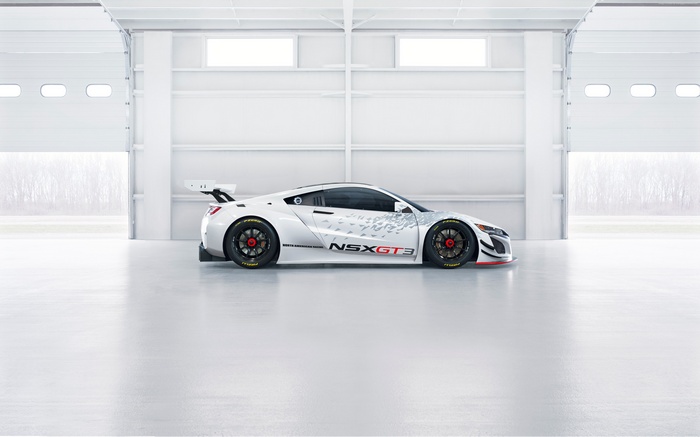 White Acura NSX GT3 race car in garage