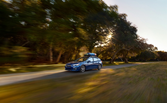 Blue Subaru Impreza 5-door 2.0i Limited with roof rack