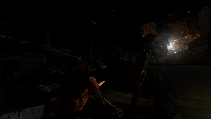 Lara Croft from Tomb Raider in a dark environment