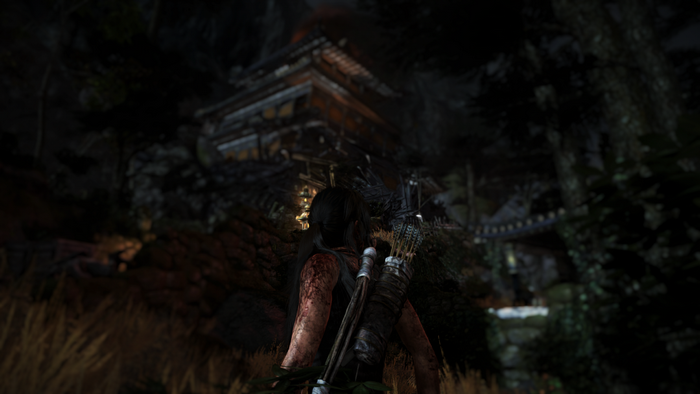Lara Croft from Tomb Raider in a dark forest