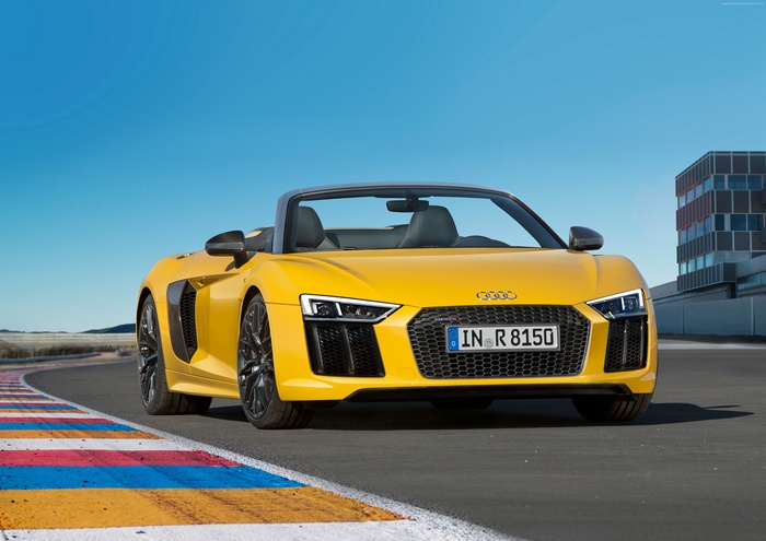 Yellow Audi R8 Convertible on a Racetrack