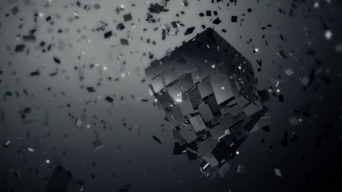 Abstract cube shattering into pieces