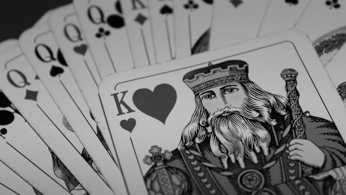 King of Hearts and Queens playing cards
