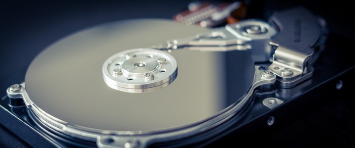 Close-up of a hard disk drive platter and read/write head