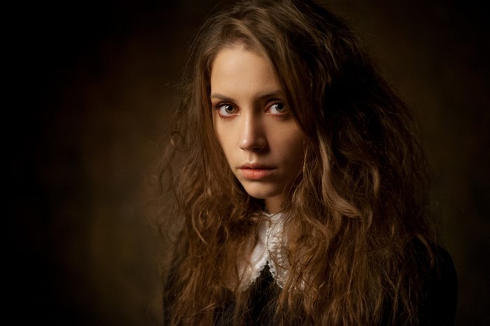 Portrait of Xenia Kokoreva with long brown hair