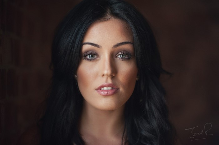 Portrait of a woman with black hair